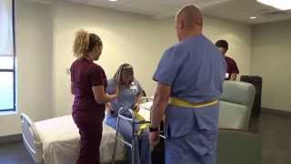 Physical Therapy Transfer Training  How To Transfer From Wheelchair To Bed [upl. by Aleahs823]